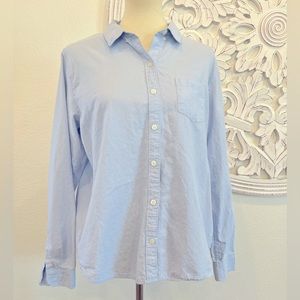 Women’s blue button down shirt